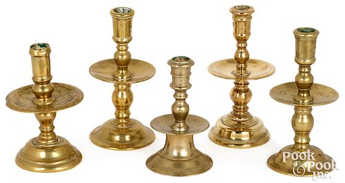 Five brass candlesticks, 17th/18th c.