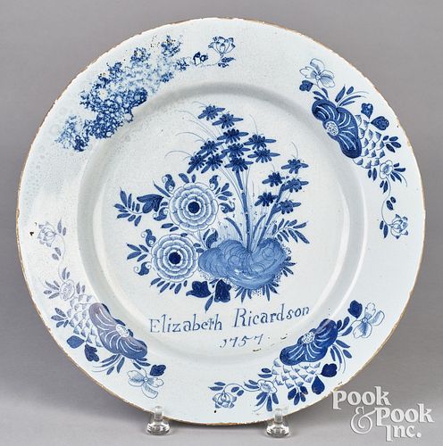 English Delftware charger, dated 1757