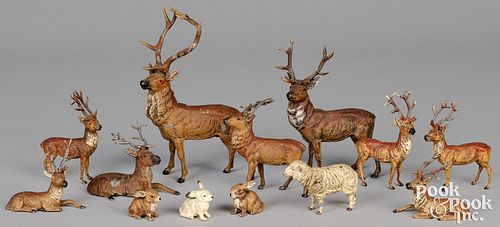 Nine German painted spelter deer