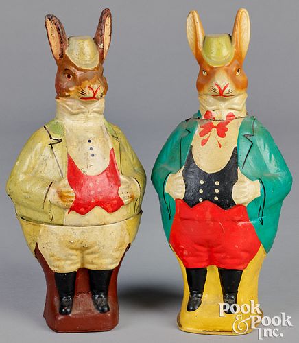 Two dressed rabbit candy containers