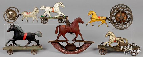 Six painted tin platform and bell pull toys