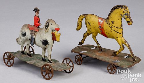 Two painted tin platform pull toys, 19th c.