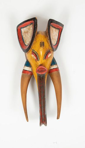 WEST AFRICAN POLYCHROME CARVED WOOD ELEPHANT MASK, 20TH C., H 20", W 9", D 7" 