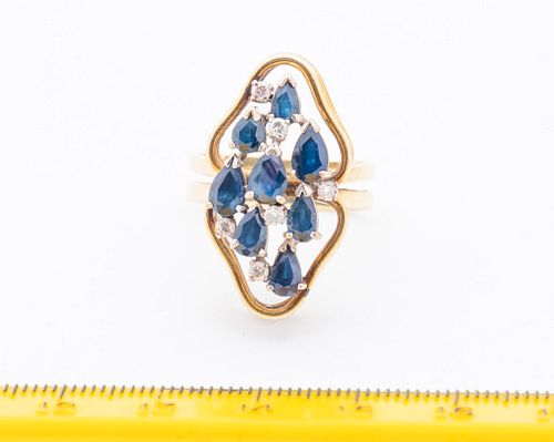 + BLUE SAPPHIRE AND DIAMOND CLUSTER RING, 14 KT C 1960 