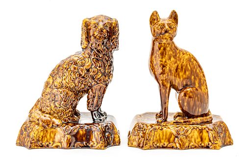 ROCKINGHAM  GLAZED YELLOW WARE CAT AND DOG, C 1860, TWO H 10 3/4" W 8 3/4" 