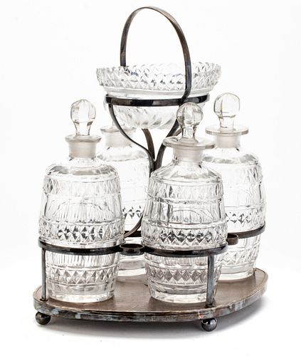 CRYSTAL DECANTERS (4) IN SILVERED METAL FRAME WITH CAVIAR DISH C 1930 H 11" W 11" 
