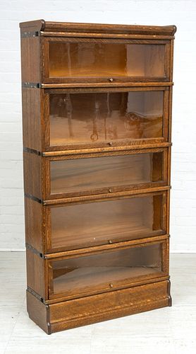 AMERICAN CARVED OAK FIVE-TIER BARRISTER BOOKCASE, 20TH C., H 68.25", W 34", D 12.25" 