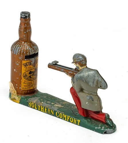 CONFEDERATE SOLDIER MECHANICAL RIFLE FIRES COIN INTO SOUTHERN COMFORT BOTTLE (NO KEY) GOOD WORKING CONDITION (1) H 6" L 8.5" 