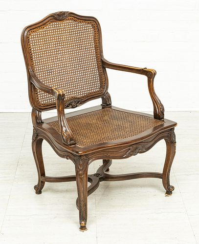 LOUIS XV STYLE CARVED WALNUT  AND CANE CHAIR  H 37" W 25" 