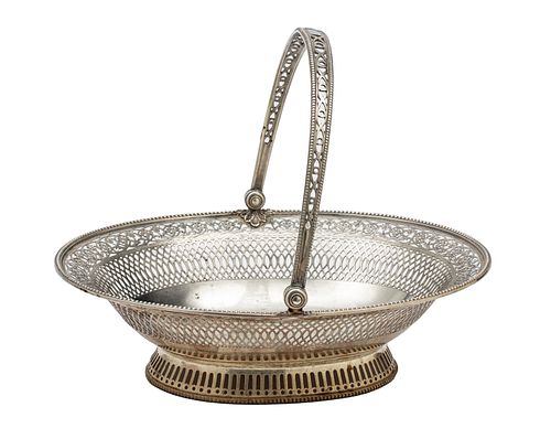 C.S. HARRIS & SONS (ENGLISH) FOR TIFFANY & CO. STERLING SILVER CAKE BASKET, 1917, W 10.5", L 13", T.W. 33.11 TOZ 
