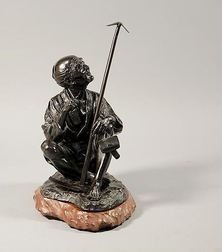 Japanese Meiji period bronze old man smoking opium pipe