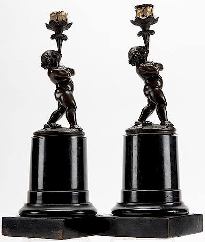 Pair of Antique Boy Conjurer Candle Holders