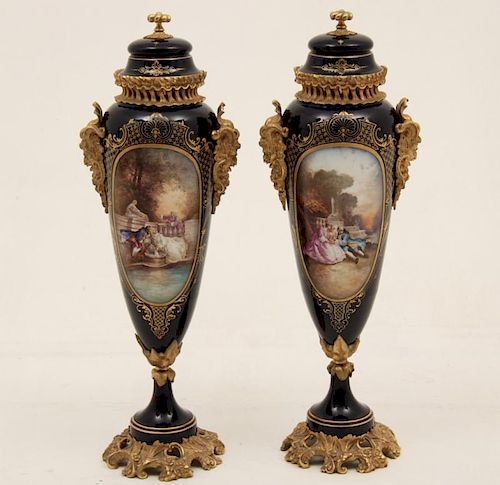 PAIR OF 30" SIGNED FRENCH SEVRES PORCELAIN CAPPED URNS