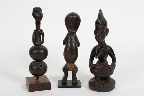 AFRICAN CARVED WOOD FIGURES GROUP OF THREE H 8.75"-9.5" W 2"-3.5" 
