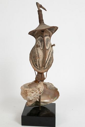 AFRICAN WOOD, WICKER, PIGMENT AND A SHELL, CEREMONIAL FINIAL H 19" W 8.5 D 6" 
