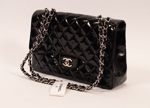 CHANEL (FRENCH, ESTABLISHED 1909) CLASSIC JUMBO FLAP BAG BLACK PATENT LEATHER WITH SILVER HARDWARE H 8" W 3.5" L 12" 