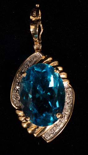 BLUE TOPAZ AND 14KT YELLOW GOLD PENDANT 