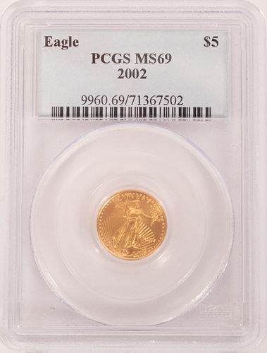 $5.DOLLAR GOLD COIN CERTIFIED MS - 69, ' EAGLE IN FLIGHT APPROACHES HER NEST ' 2002 (1) H 7" W 4" 