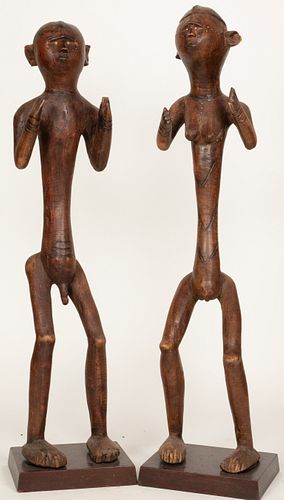 NYAMWEZI, TANZANIA, AFRICAN, CARVED WOOD MALE AND FEMALE FIGURAL SCULPTURES PAIR H 31" W 7.5" D 6" 