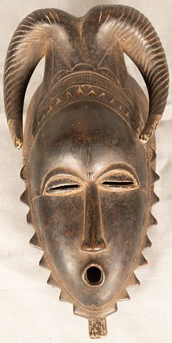 BAULE, IVORY COAST, AFRICAN CARVED MASK OF FEMALE EARLY/MID 20TH C. H 6" W 12" 