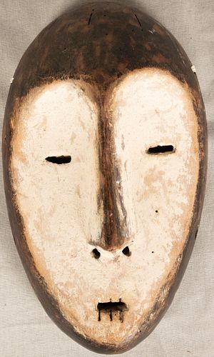 NGIL SOCIETY IN CAMEROON, AFRICAN, CARVED WOOD WITH PIGMENT, FANG MASK, H 8.5" W 5" 