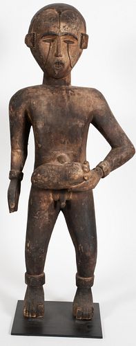 IDOMA, NIGERIA,  AFRICAN PRIMITIVE POLYCHROME CARVED WOOD STANDING MALE FIGURE, H 35.5", W 15", D 8.5" 