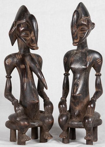 AFRICAN POLYCHROME CARVED WOOD SEATED MALE AND FEMALE FIGURES, TWO, H 9.5", W 3.5", D 3" 