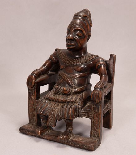 AFRICAN CARVED WOOD SEATED FIGURE H 9.75" W 6.75" D 6" 