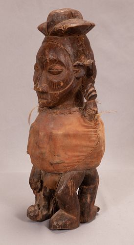 DEMOCRATIC REPUBLIC OF THE CONGO, AFRICAN WOOD AND CLOTH  TEKE FETISH FIGURE WITH BONGA 20TH C. H 19" W 7.25" 