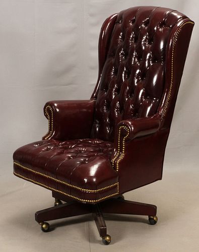 BURGUNDY LEATHER AND MAHOGANY SWIVEL DESK CHAIR H 48" 