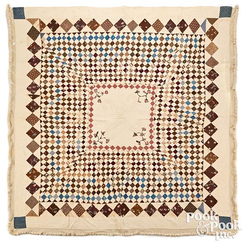Early patchwork trapunto quilt