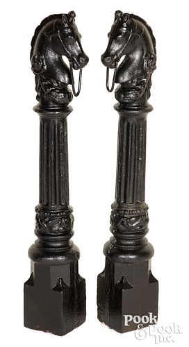 Pair of cast iron horse head hitching posts