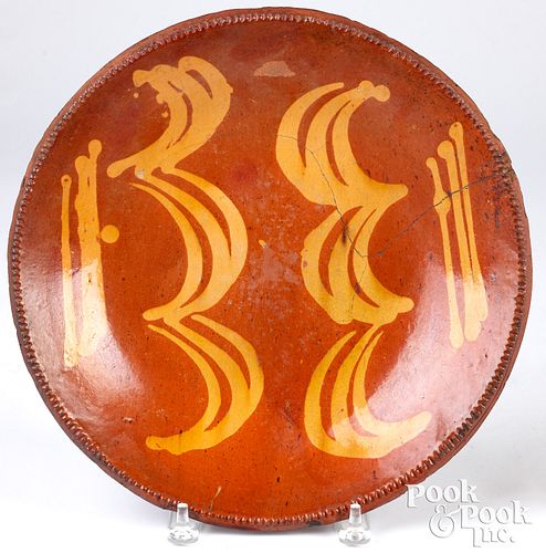 Pennsylvania slip decorated redware charger