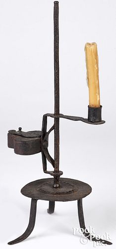Wrought iron fat lamp with candleholder