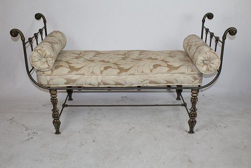 Scrolled iron bench with upholstered seat