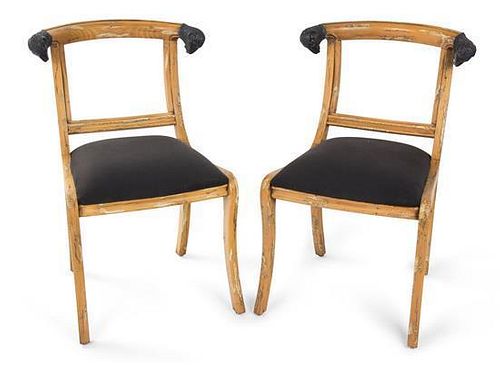 A Set of Four Continental Painted Dining Chairs Height 33 inches.