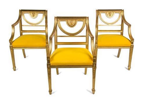 A Set of Eight Neoclassical Style Giltwood Dining Chairs Height 34 1/2 inches.