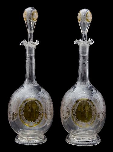 A Pair of Etched and Amber Overlay Glass Decanters Height 11 3/4 inches.