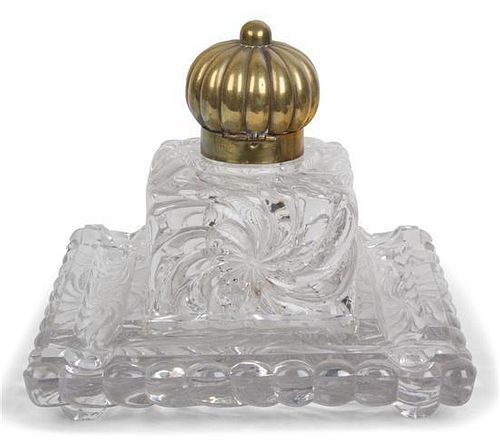 An English Molded Glass Inkwell on Square Base Height 7 1/4 x width 8 3/8 inches.