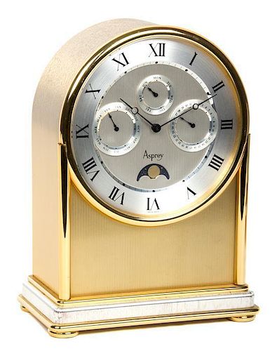 An Asprey Gilt Bronze Clock Height 9 inches.