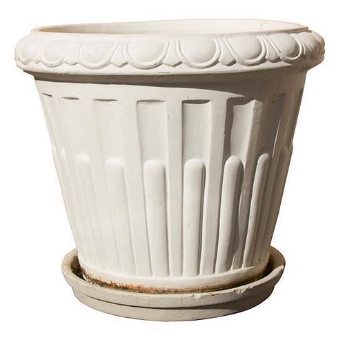 A Pair of Cast Cement Planters Height 27 x diameter 32 inches.