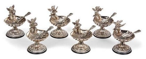A Set of Six American Sterling Open Salts, , each in the form of a shell with a putto form handle and raised on a trumpet bas