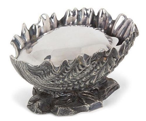 An English Silver-Plate Shell-form Spoon Warmer Height 3 1/4 inches.