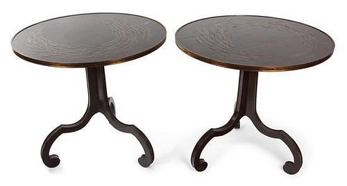 A Pair of Parcel-Gilt and Black Lacquered Occasional Tables Height 29 x diameter 31 inches.