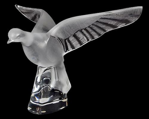 A Lalique Molded and Frosted Glass Figure of a Bird Height 11 3/4 inches.
