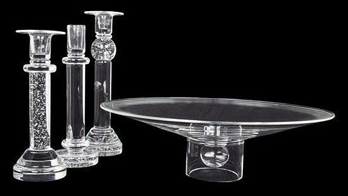Three Steuben Glass Candlesticks Height of tallest 11 inches.