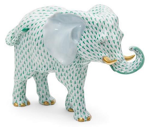 A Herend Porcelain Elephant Height 10 x length 14 inches.