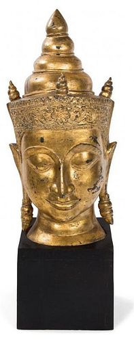 A Southeast Asian Gilt Bronze Head of Buddha Height 31 inches.