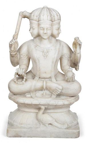 An Indian Carved Marble Figure of the God Braham Height 15 1/2 inches.