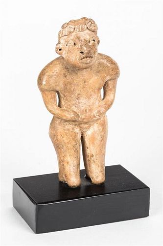 A San Salvador Standing Female Figure Height 5 3/4 inches.